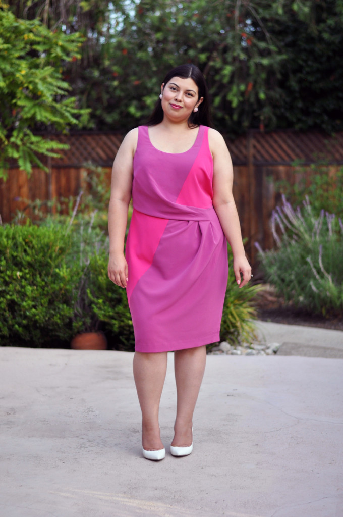 Plus size blogger Jay Miranda wearing pink sheath dress