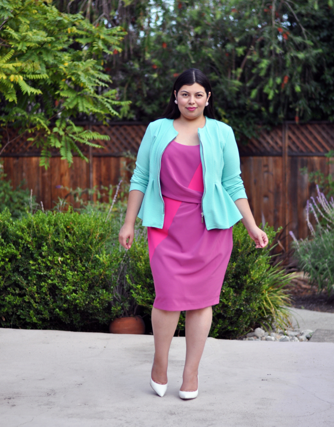 Plus size blogger Jay Miranda wearing pink sheath dress and mint jacket