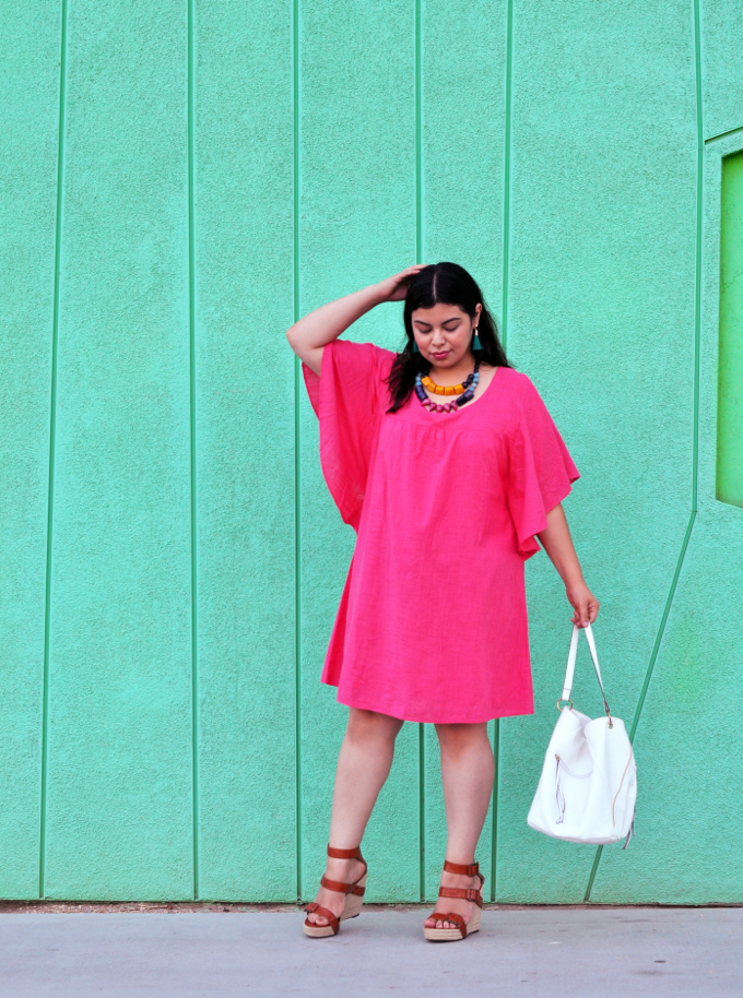 Pink plus size dress worn by blogger Jay Miranda