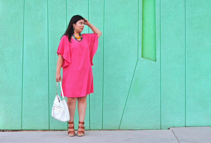 Pink plus size dress worn by blogger Jay Miranda